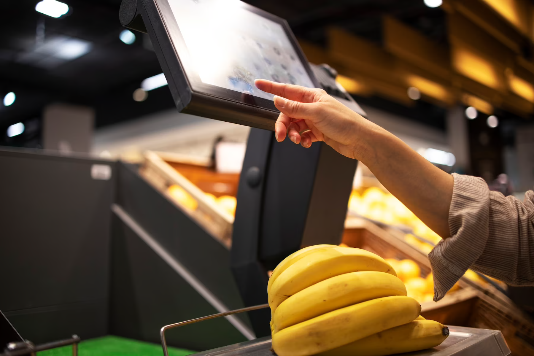 customer using kiosk in the mart