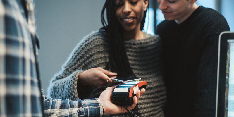 A-couple-paying-for-food-via-contactless-payment-while-they-forgot-wallet-at-home