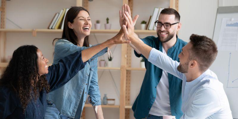 Employees-hi-five-after-a-training-session
